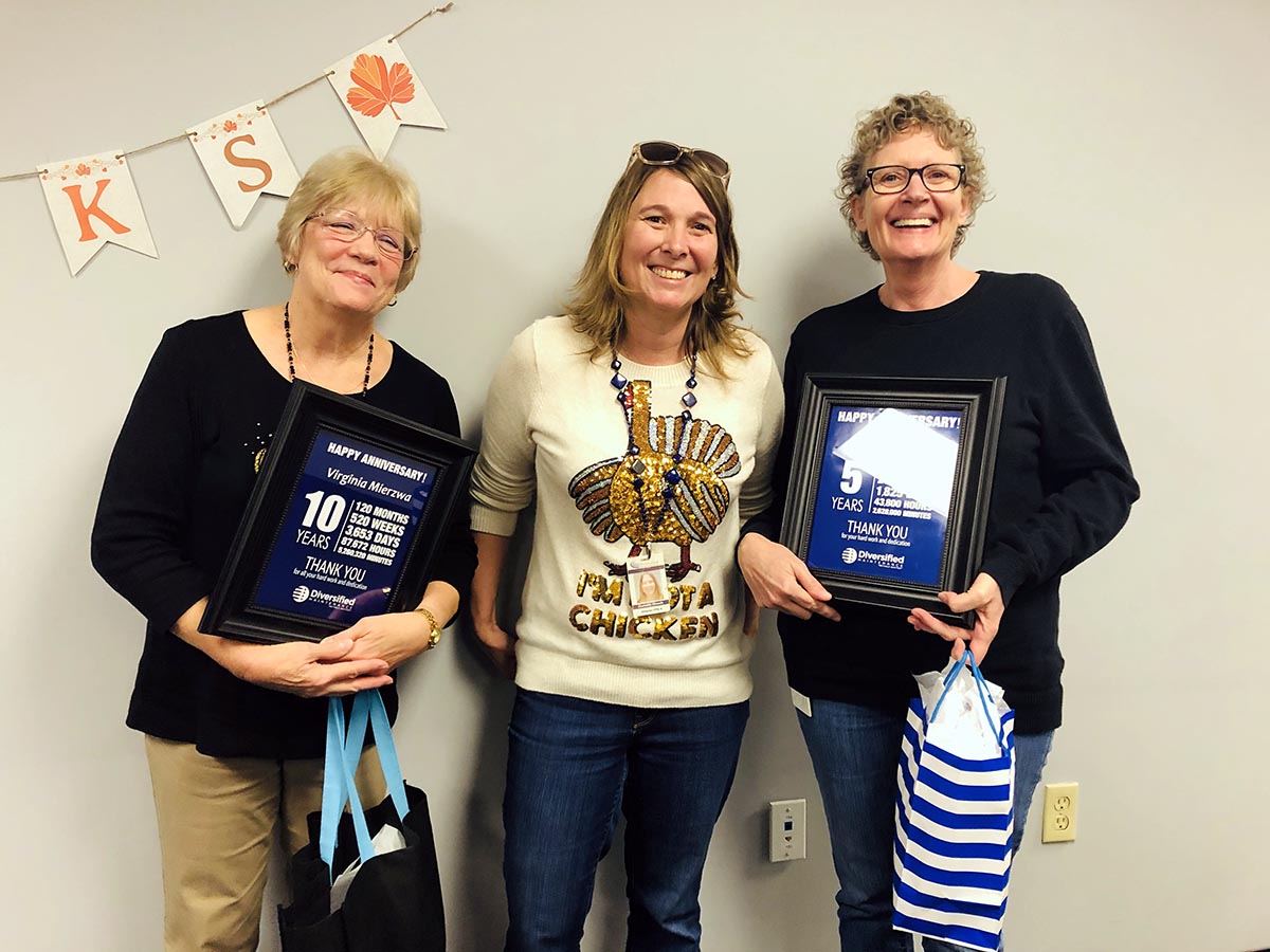 Virginia Mierzwa, Sabine Harb, and Kelly Devin Receive Service Awards